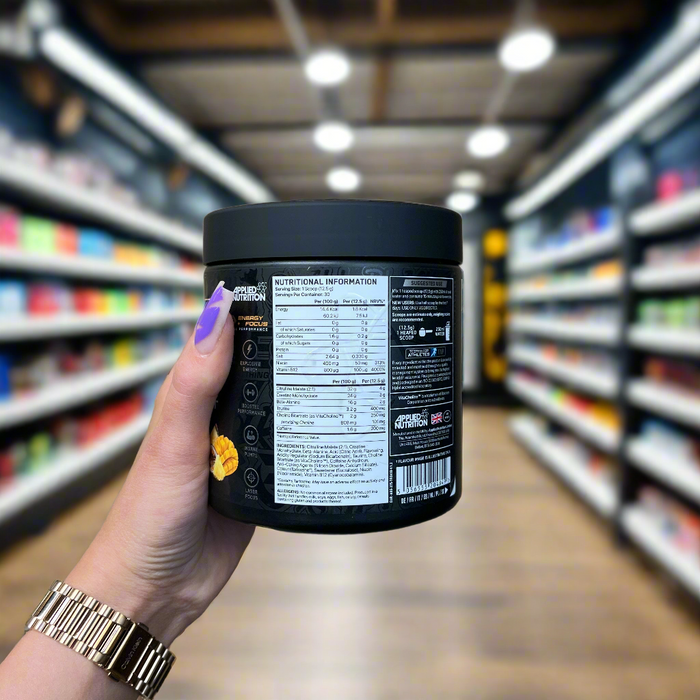Close-up of (Applied Nutrition ABE Ultimate Preworkout 315g) held up inside My Supplement Shop, clearly showing key ingredients on the packaging in a Sports Nutrition setting.