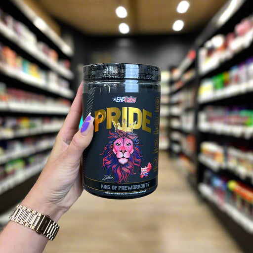 Close-up of (EHP Labs Pride Preworkout 40 Servings) held up inside My Supplement Shop, clearly showing the front label in a Sports Nutrition setting.