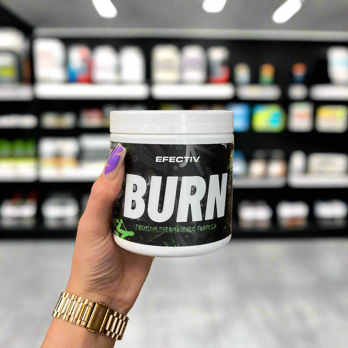 Close-up of (Efectiv Nutrition BURN Thermogenic Supplement) held up inside My Supplement Shop, clearly showing the front label in a Sports Nutrition setting.