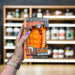 Close-up of (Grenade Thermo Detonator Weight Management Supplement Tub of 100 Capsules) held up inside My Supplement Shop, clearly showing the front label in a Sports Nutrition setting.
